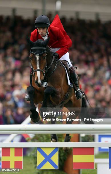 Great Britain's Harry Meade riding Wild Lone competes in the show jumping phase during day five of the Mitsubishi Motors Badminton Horse Trials,...