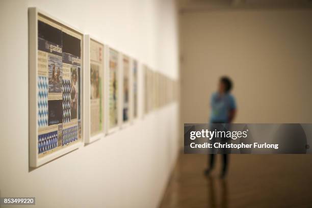 Gallery volunteer views, Negative Positives: The Guardian Archive by artist Lubaina Himid during a press preview for the 2017 Turner Prize at The...