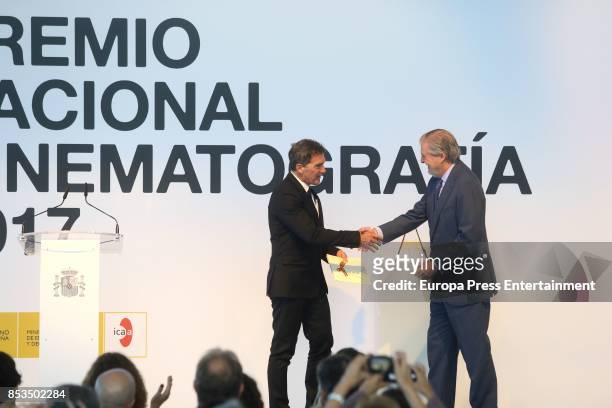 Spanish actor Antonio Banderas receives from Spanish Minister of Culture Inigo Mendez de Vigo the National Cinema Award during 65th San Sebastian...