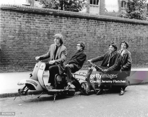 Photo of INGOES; Posed group portrait on scooters with no wheels L-R Brian Godding, Jim Cregan, Kevin Westlake and Brian Balshaw