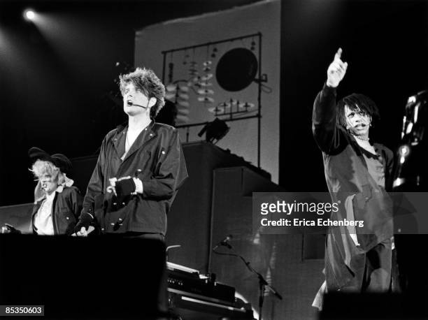 Photo of Joe LEEWAY and Tom BAILEY and Alannah CURRIE and THOMPSON TWINS; L- R Alannah Currie, Tom Bailey and Joe Leeway performing live on stage