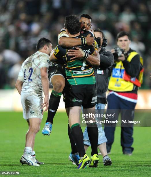 Northampton Saints Lither Burrell celebrates with Phil Dowson after the final whistle against the Leicester Tigers during the Aviva Premiership...