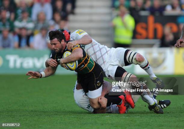 Northampton Saints Ben Foden is tackled by Leicester Tigers Julian Salvi during the Aviva Premiership Play-off, Semi Final match at Franklins...