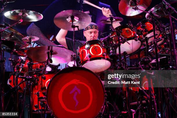 Photo of Neil PEART and RUSH, Neil Peart performing live on stage