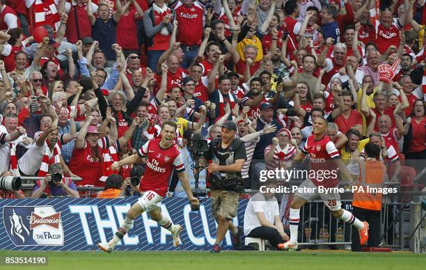 Arsenal's Aaron Ramsey celebrates scoring his side's third goal