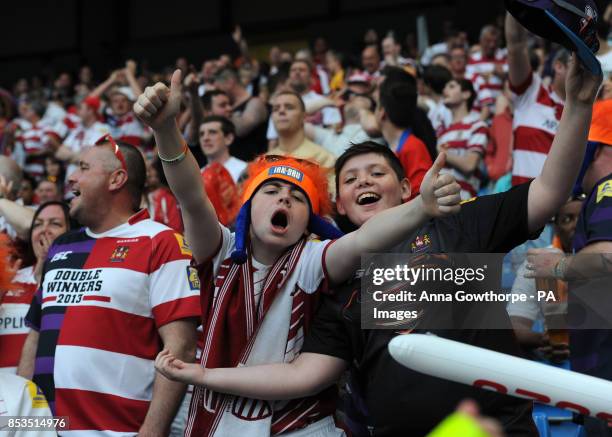 Wigan Warriors' fans in the stands during the First Utility Super League Magic Weekend match at the Etihad Stadium, Manchester.