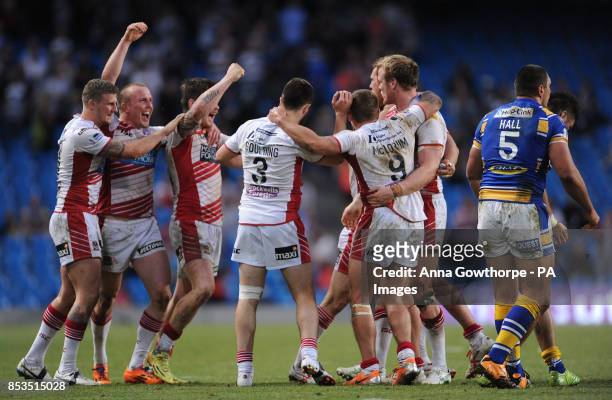 Wigan Warriors' players celebrate beating Leeds Rhinos during the First Utility Super League Magic Weekend match at the Etihad Stadium, Manchester.