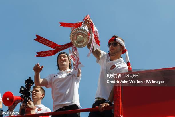 Arsenal's Tomas Rosicky and Jack Wilshere during the FA Cup winners parade at Islington Town Hall, London.