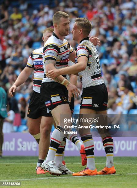Bradford Bulls' Jamie Foster is congratulated by Adam Sidlow after sccoring a try during the First Utility Super League Magic Weekend match at the...