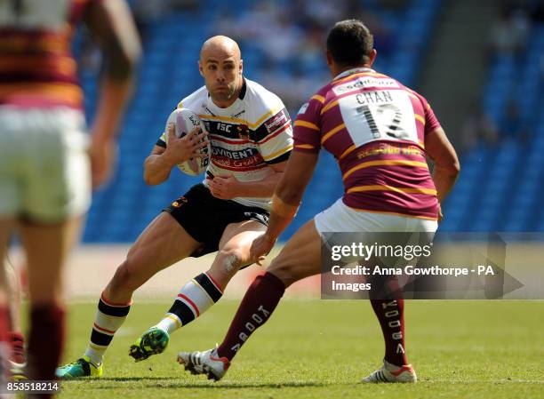 Bradford Bulls' Adrian Purtell faces up to Huddersfield Giants' Jason Chan during the First Utility Super League Magic Weekend match at the Etihad...