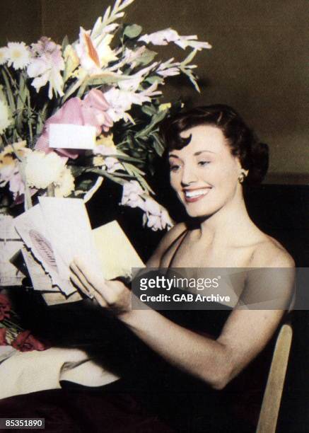 Photo of Kay STARR; Reading wellwishers cards