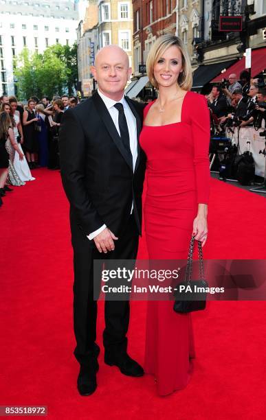 Ross Kemp and Renee O'Brien arriving for the 2014 Arqiva British Academy Television Awards at the Theatre Royal, Drury Lane, London.