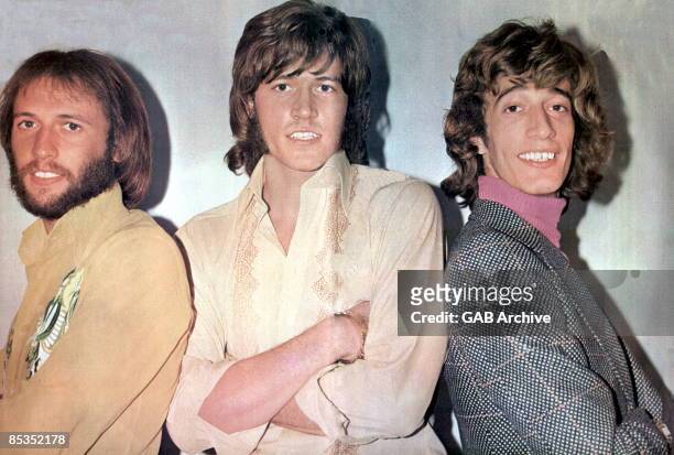 Photo of BEE GEES; Group portrait - L-R Maurice, Barry and Robin Gibb