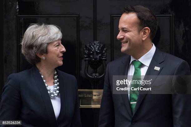 Britain's Prime Minister, Theresa May, greets Ireland's Taoiseach, Leo Varadkar, as he arrives in Downing Street on September 25, 2017 in London,...
