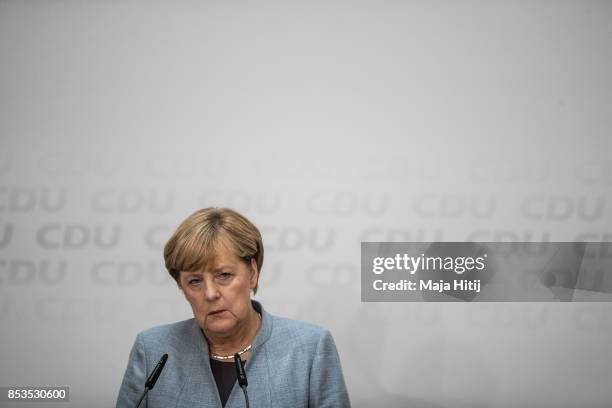 German Chancellor and Christian Democrat Angela Merkel speaks to the media the day after the CDU won 32.9% of the vote and a first place finish in...