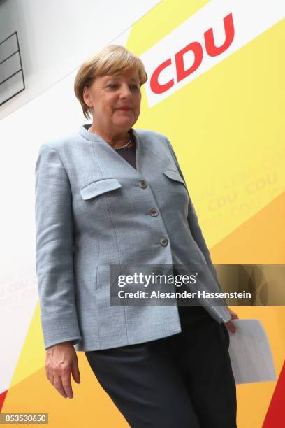 German Chancellor and Christian Democrat Angela Merkel arrives at CDU headquater to speak to the media the day after the CDU won 32.9% of the vote...