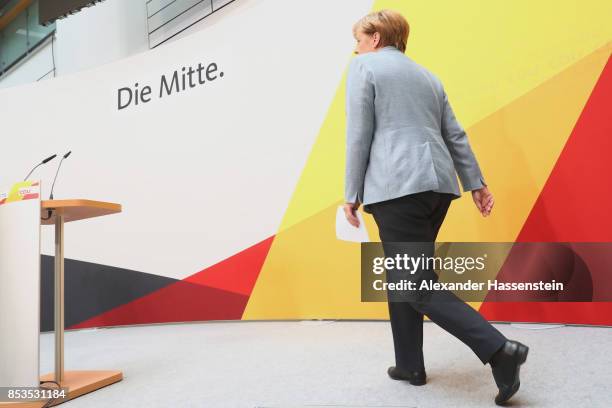 German Chancellor and Christian Democrat Angela Merkel arrives at CDU headquater to speak to the media the day after the CDU won 32.9% of the vote...