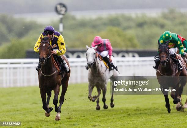 Eastern Dragon ridden by Jack Duern comes home to win The TJ Group Apprentice Handicap during day one of the May Festival at Goodwood Racecourse,...