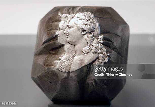 Steel stamp representing French King Louis XVI and Marie-Antoinette is displayed during the press visit at the "Monnaie de Paris" on September 25,...