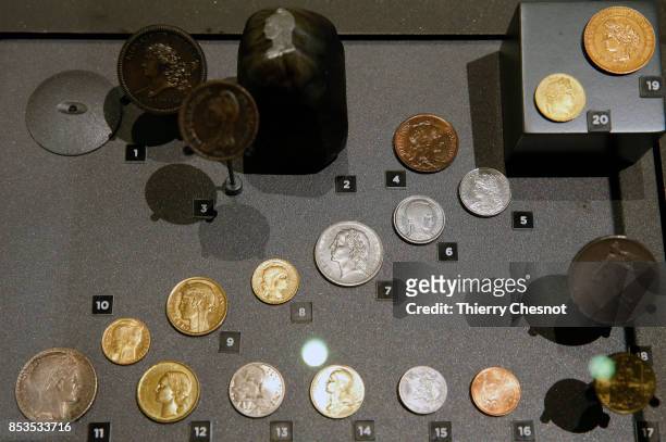 Coins representing Marianne, the symbolic figure of the French Republic are displayed during the press visit at the "Monnaie de Paris" on September...