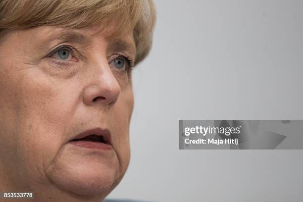 German Chancellor and Christian Democrat Angela Merkel speaks to the media the day after the CDU won 32.9% of the vote and a first place finish in...
