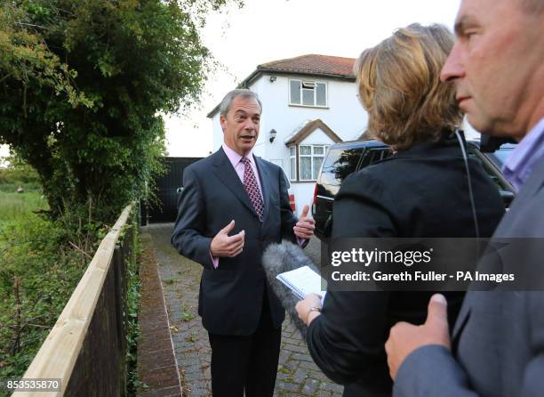 Leader Nigel Farage gives a media interview before leaving his home in Cudham, Kent, as his party made gains across the country following yesterdays...