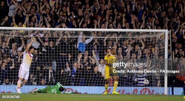 Nigeria's Azubuike Egwuekwe scores an own goal during the International Friendly match at Craven Cottage, London.