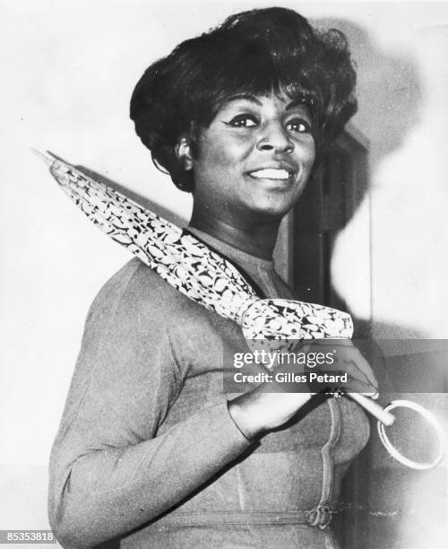 Photo of Lorraine ELLISON; Posed portrait of Lorraine Ellison, umbrella