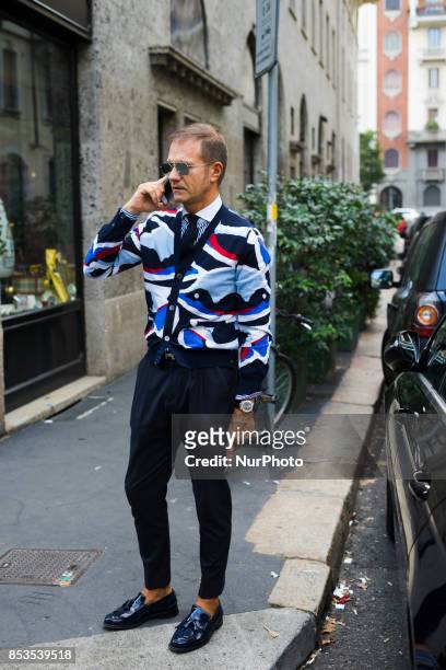 Street Style during the Milan Fashion Week in Milan, Italy, on September 24, 2017.