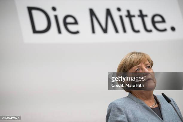 German Chancellor and Christian Democrat Angela Merkel gives a statement to the media the day after the CDU won 32.9% of the vote and a first place...