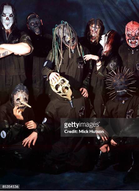Photo of SLIPKNOT and Chris FEHN and Shawn CRAHAN and Sid WILSON and Craig JONES and Corey TAYLOR and Mick THOMSON and Joey JORDISON and Paul GRAY...
