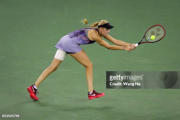 Donna Vekic of Croatia returns a shot during the match against Shuai Zhang of China on Day 2 of 2017 Dongfeng Motor Wuhan Open at Optics Valley...