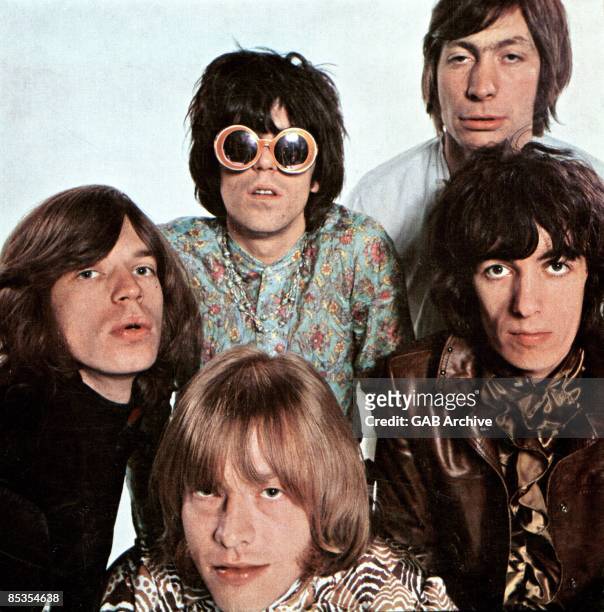 Photo of ROLLING STONES and Charlie WATTS and Mick JAGGER and Keith RICHARDS and Bill WYMAN and Brian JONES; Posed group portrait Clockwise from left...