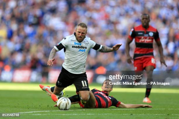 Derby County's Johnny Russell is fouled by Queens Park Rangers' Gary O'Neil to earn a red card