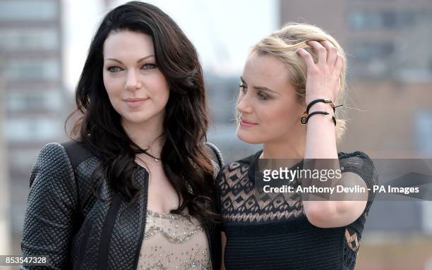 Taylor Schilling and Laura Prepon during a photocall to promote the new season of Orange is the new Black. PRESS ASSOCIATION Photo. Picture date:...