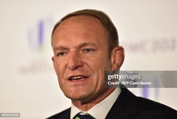 Former South African rugby international Francois Pienaar takes part in a press conference after South Africa presented their bid to host the 2023...