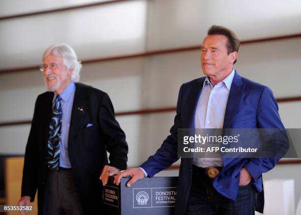 French Oceanographic explorer Jean Michel Cousteau and US actor, producer and former governor of California Arnold Schwarzenegger pose during a...