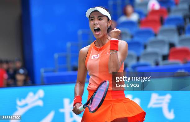 Wang Qiang of China celebrates after winning the first round match against Sloane Stephens of the United States on Day 2 of 2017 Dongfeng Motor Wuhan...