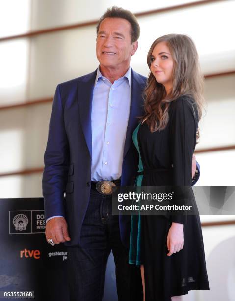 Actor, producer and former governor of California Arnold Schwarzenegger and US singer Maisy Kay pose during a photocall to promote the film "Wonders...