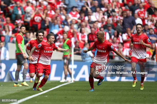 Leyton Orient's Dean Cox celebrates scoring their second goal of the game with team-mates