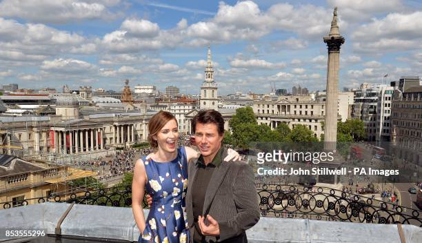 Emily Blunt and Tom Cruise at a photocall above Trafalgar Square in central London, where in their new film Edge of Tomorrow, a helicopter was landed...