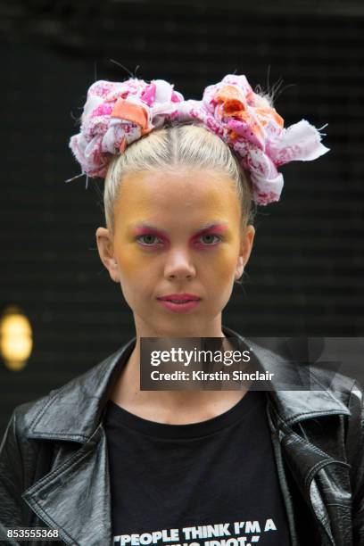 Model and DJ Fabienne Hebrard wears a Clash Magazine T shirt, Marks and Spencers coat on day 1 of London Womens Fashion Week Spring/Summer 2018, on...