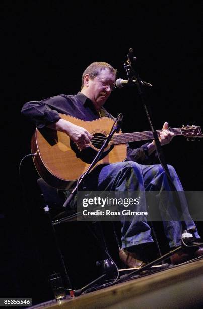 Photo of Bert JANSCH, Bert Jansch performing on stage as part of the 2008 Celtic Connections Festival, playing acoustic guitar