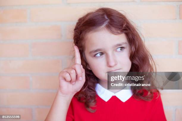 girl raising her hand - fear of writing stock pictures, royalty-free photos & images