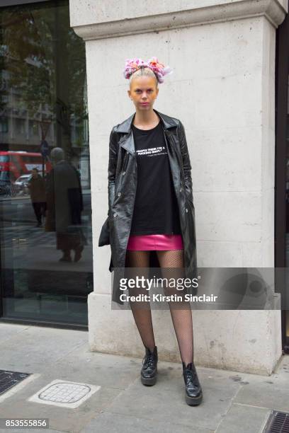 Model and DJ Fabienne Hebrard wears Topman shoes, Miss Guided skirt, Clash Magazine T shirt, Marks and Spencers coat on day 1 of London Womens...