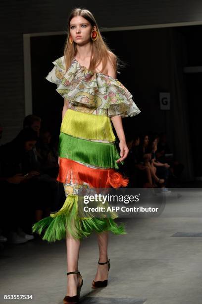 Model presents a creation for fashion house Daizy Shely during the Women's Spring/Summer 2018 fashion shows in Milan, on September 25, 2017. / AFP...