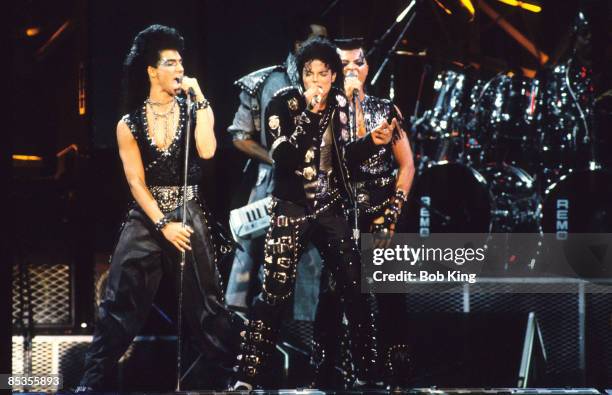 Photo of Michael JACKSON; Michael Jackson performing on stage, with backing singers, at the Paramatta Stadium in Sydney - Bad Tour