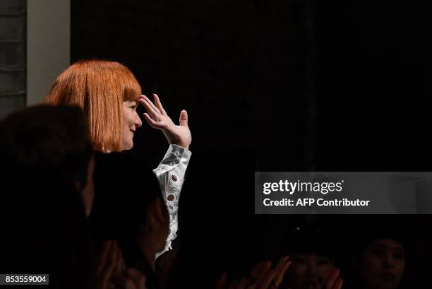Designer Daizy Shely from Israel greets the audience at the end of the show for fashion house Daizy Shely during the Women's Spring/Summer 2018...