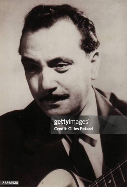 Photo of Django REINHARDT; Posed portrait of guitarist Django Reinhardt circa 1947