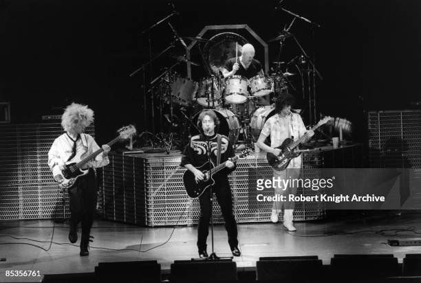 Photo of FIRM and Tony FRANKLIN and Paul RODGERS and Chris SLADE and Jimmy PAGE; Group performing on stage L-R Tony Franklin, Paul Rodgers, Chrsi...